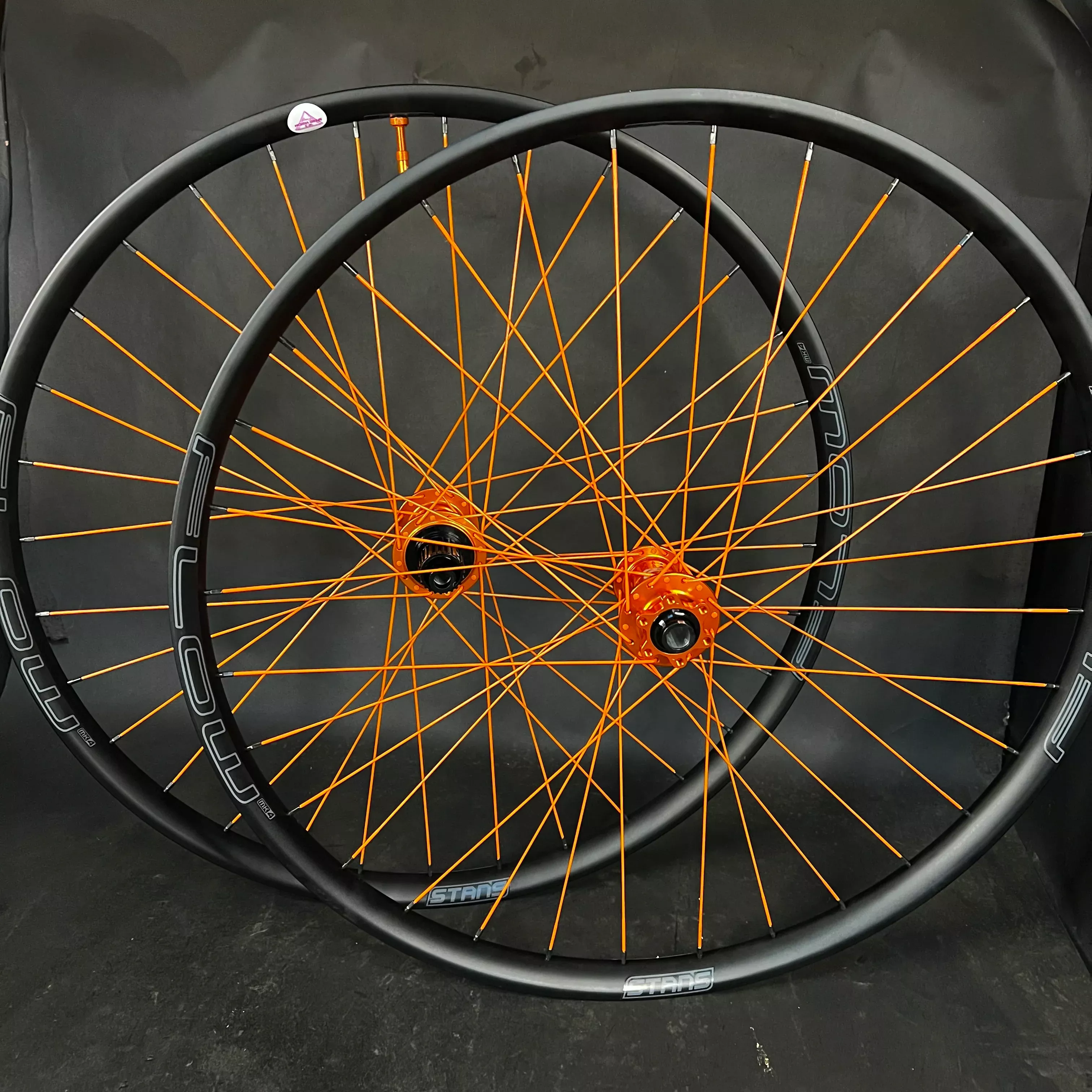 Trail: Full Orange Flow MK4 rims W/ Hydra 2 Boost hubs